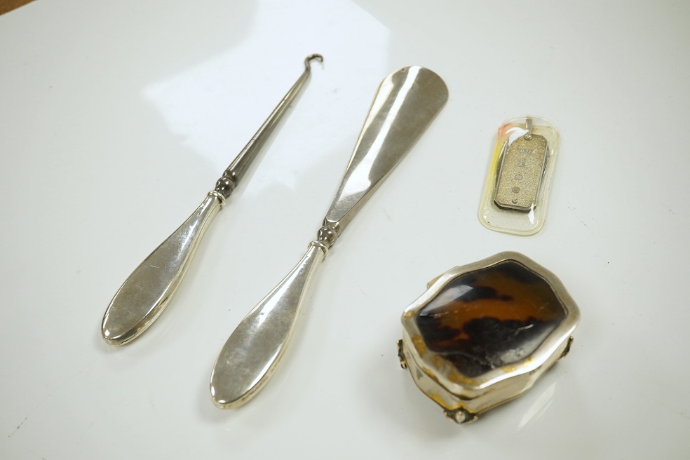 A George V silver and tortoiseshell trinket box, 6.5cm, a planished sterling cigarette case, an early silver wrist watch and sundries. Condition - fair.